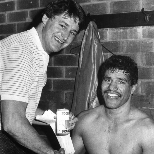 Newcastle coach Allan McMahon congratulates Sam Stewart after the Knights’ Winfield Cup game against Cronulla in 1988 after hearing his wife Vicki had given birth to a son. Picture: Robert McKell