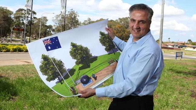 A multicultural installation will be erected at the entrance of the Showground, illustrated in plans held by Mayor Frank Carbone. Picture: Robert Pozo