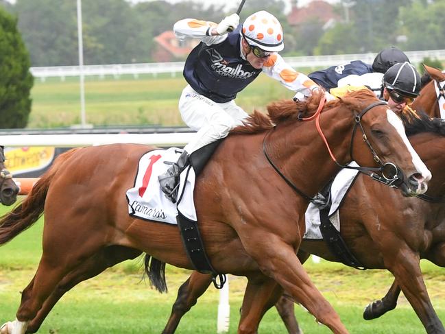 Just Folk ridden by Mark Zahra wins the Lamaro's Hotel Eclipse Stakes at Caulfield Racecourse on December 02, 2023 in Caulfield, Australia. (Photo by Brett Holburt/Racing Photos via Getty Images)