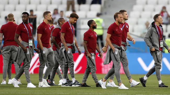 England’s team inspects the pitch before their Group G match against Tunisia. Picture: AP