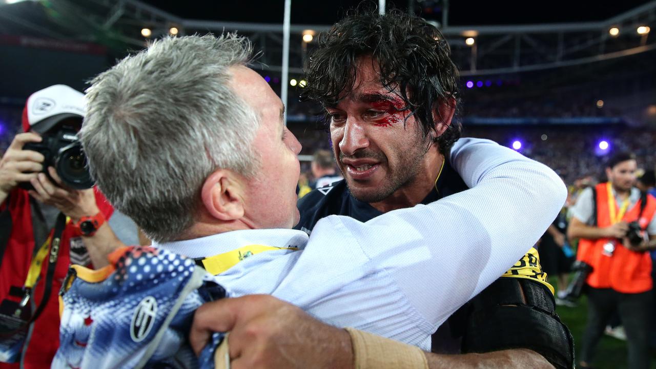 Cowboy's coach Paul Green and Johnathan Thurston celebrate after the Cowboys won during the 2015 NRL Grand Final. Pic Brett Costello