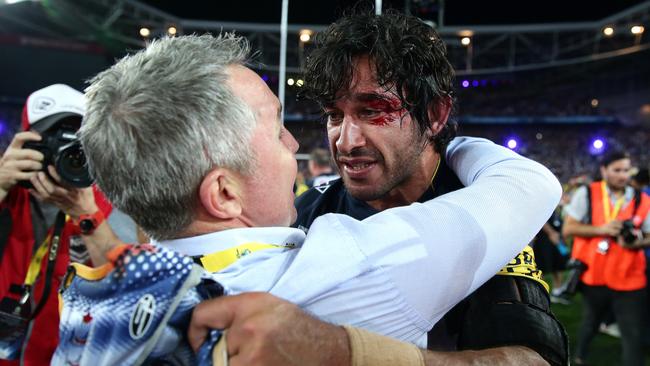 Cowboy's coach Paul Green and Johnathan Thurston celebrate after the Cowboys won during the 2015 NRL Grand Final. Pic Brett Costello