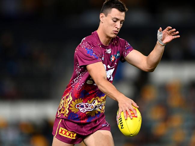 BRISBANE, AUSTRALIA - MAY 18: Hugh McCluggage of the Lions warms up ahead of the round 10 AFL match between Brisbane Lions and Richmond Tigers at The Gabba, on May 18, 2024, in Brisbane, Australia. (Photo by Albert Perez/AFL Photos via Getty Images)