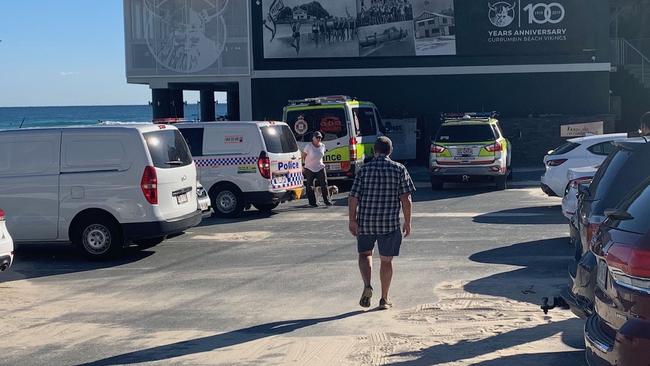 Emergency services near Currumbin surf club following a drowning on Friday morning. Picture: Greg Stolz