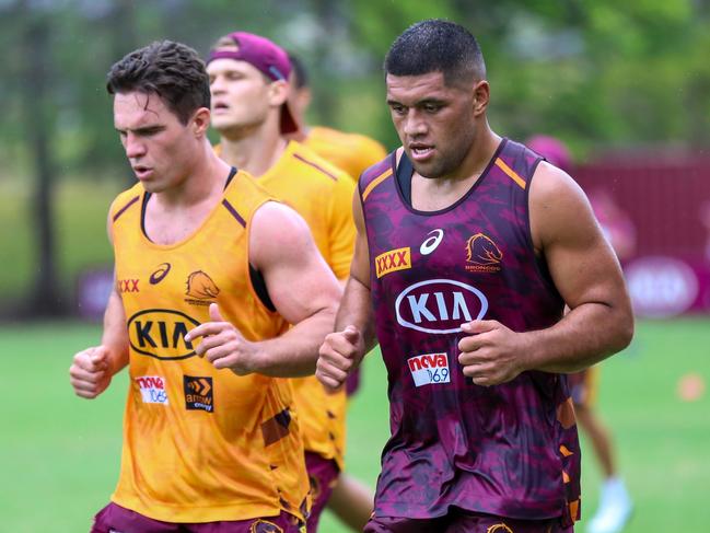 John Asiata slogs it out at pre-season training. Picture: Jorja Brinums/QRL