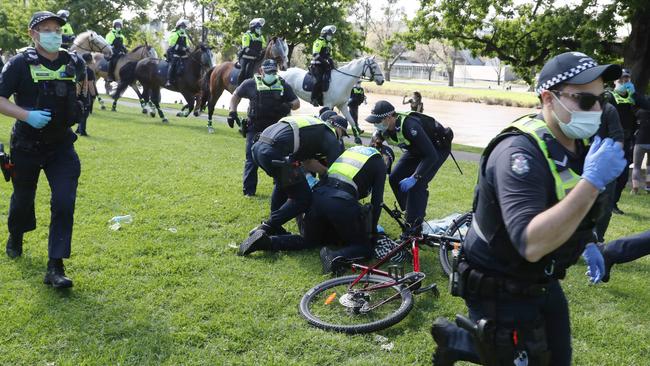 Police swooped quickly on the protesters. Picture: David Crosling