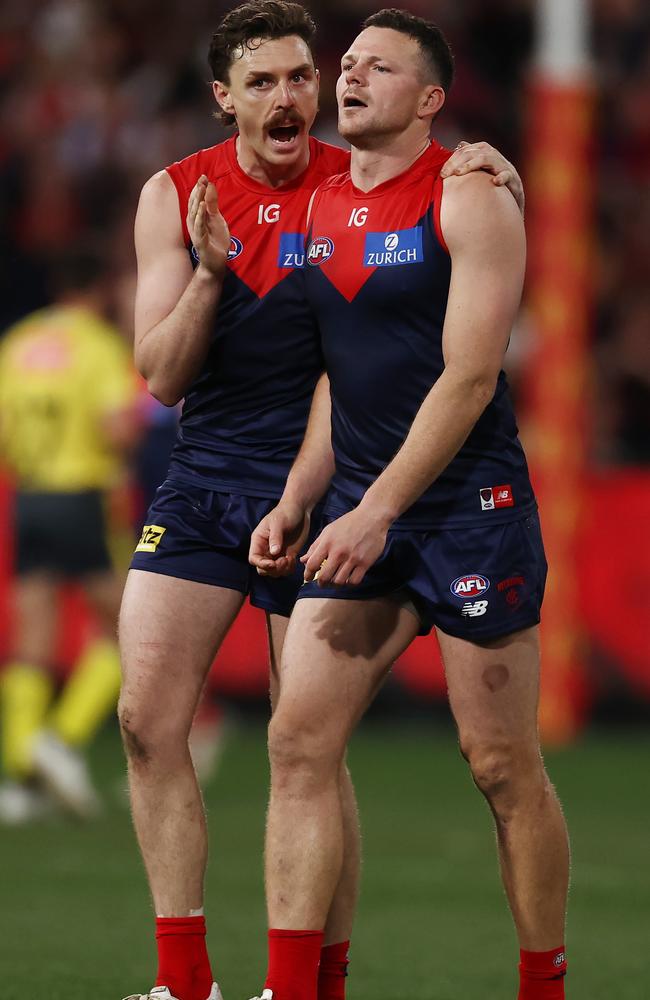 Jake Lever (left) and Steven May will be tasked with crucial roles on Tom Hawkins and a roaming Jeremy Cameron when Melbourne faces Geelong on Saturday night. Picture: Michael Klein
