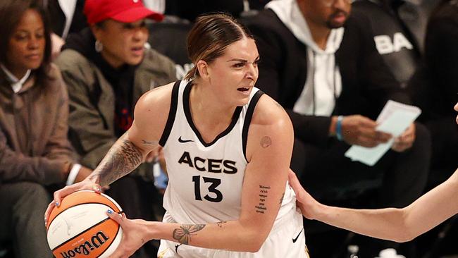 NEW YORK, NEW YORK - OCTOBER 18: Cayla George #13 of the Las Vegas Aces looks to pass against Breanna Stewart #30 of the New York Liberty in the third quarter during Game Four of the 2023 WNBA Finals at Barclays Center on October 18, 2023 in New York City. (Photo by Sarah Stier/Getty Images)