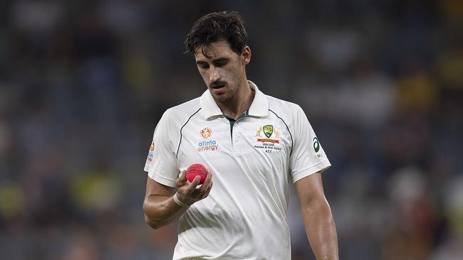 Mitchell Starc is less dominant with the red ball over the pink ball. Picture: AAP