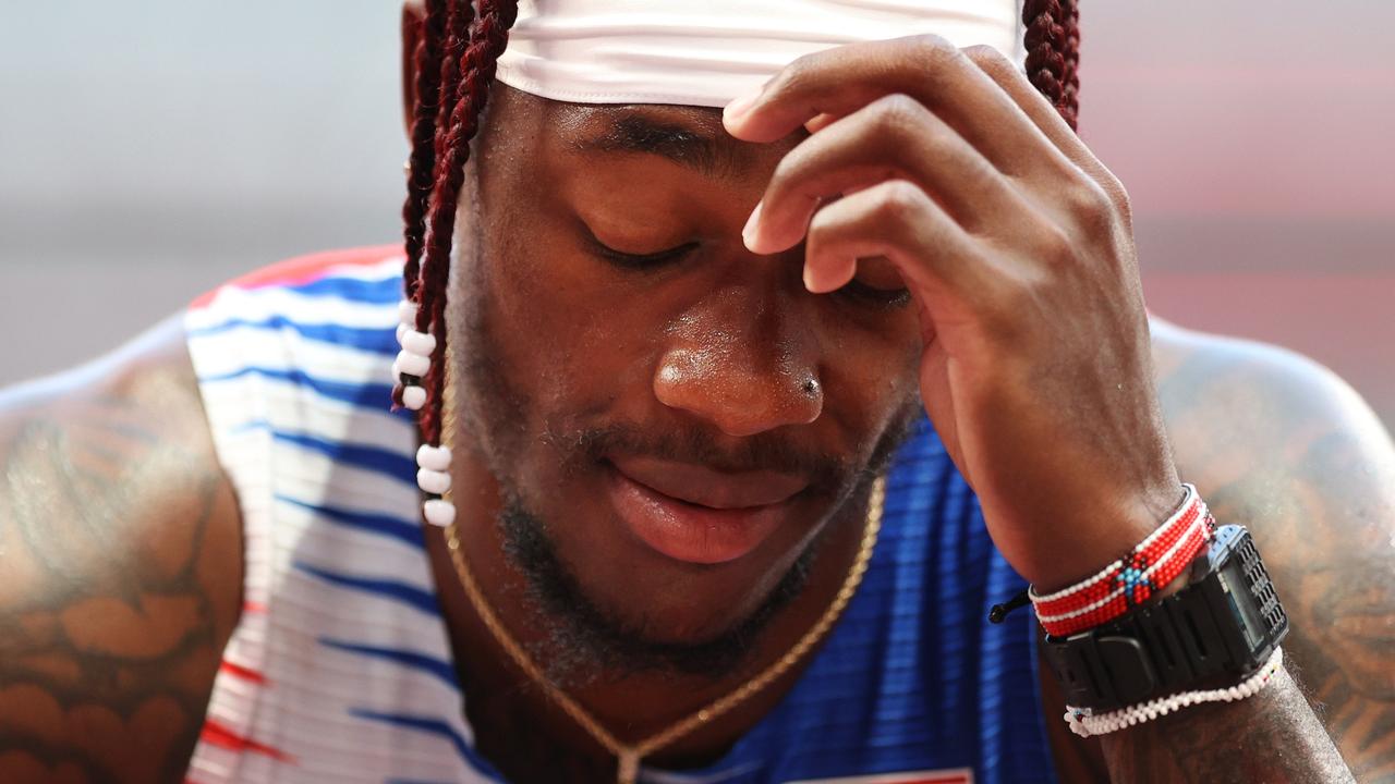 TOKYO, JAPAN - AUGUST 05: Cravon Gillespie of Team United States reacts after coming in sixth in round one of the Men's 4 x 100m Relay Heat 2 on day thirteen of the Tokyo 2020 Olympic Games at Olympic Stadium on August 05, 2021 in Tokyo, Japan. (Photo by Patrick Smith/Getty Images)