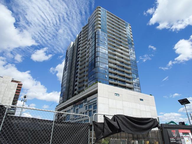 MELBOURNE AUSTRALIA - NewsWire Photos DECEMBER 28, 2024: Photo of Liberty 1 building in Footscray with diggers in the front where Liberty 2 was to be built. Homes under construction hang in balance as Bensons Property Group enters administration, Picture: NewsWire / Luis Enrique Ascui