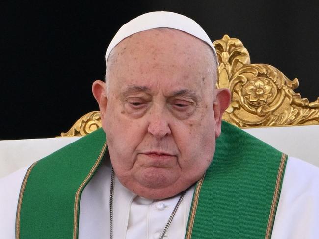 (FILES) Pope Francis celebrates the mass for the Jubilee of the Armed Forces at St. Peter's square in the Vatican on February 9, 2025. The Vatican on February 18, 2025 cancelled two of Pope Francis's events at the weekend as the 88-year-old continues to receive hospital treatment for bronchitis. (Photo by Alberto PIZZOLI / AFP)