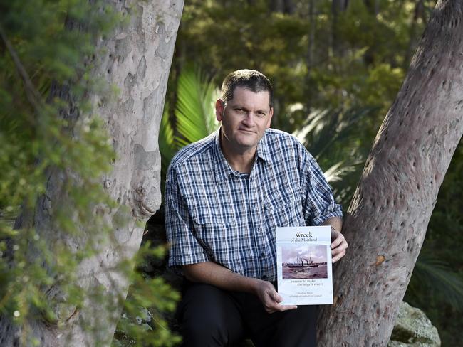 Geoffrey Potterwith the book he’s written about the wreck of the Maitland on May 6, 1898.