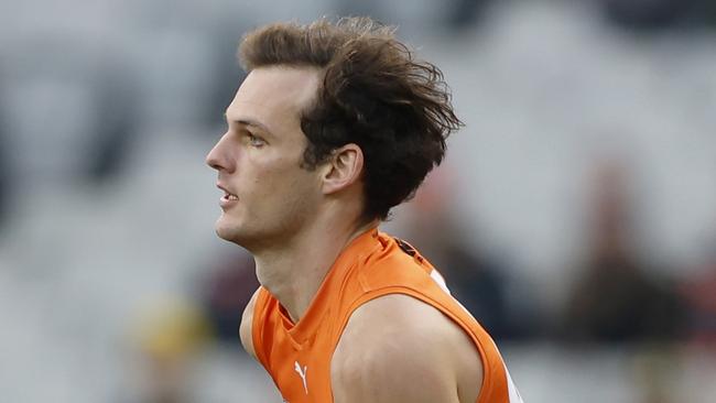 MELBOURNE, AUSTRALIA - JULY 14:  Jack Buckley of the Giants runs with the ball during the round 18 AFL match between Richmond Tigers and Greater Western Sydney Giants at Melbourne Cricket Ground, on July 14, 2024, in Melbourne, Australia. (Photo by Darrian Traynor/AFL Photos/via Getty Images)