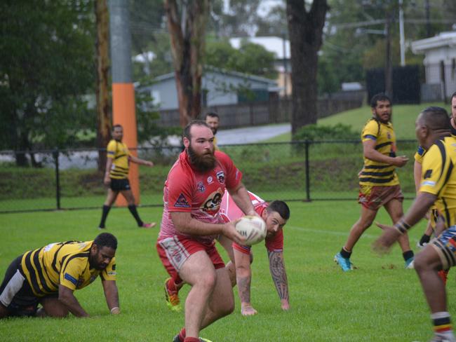 Marty McCracken with the ball for the Red Ants.