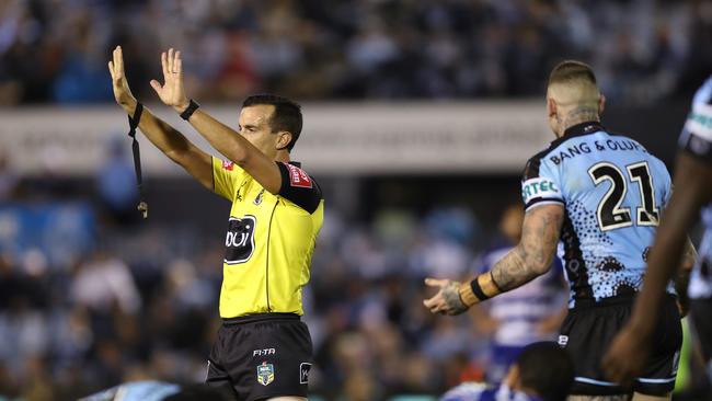 Referee Matt Cecchin sends Cronulla's Josh Dugan to the sin-bin. He was the last and 14th player of the round to be sin-binned.