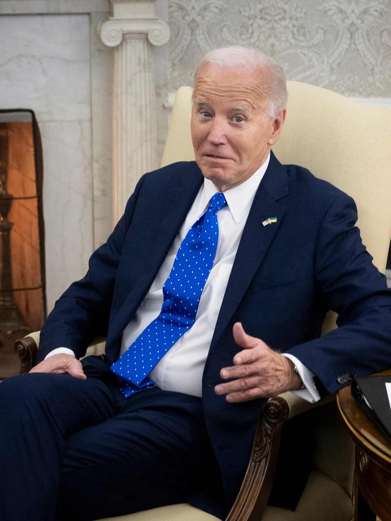 Biden in the Oval Office. Photo by Brendan Smialowski / AFP