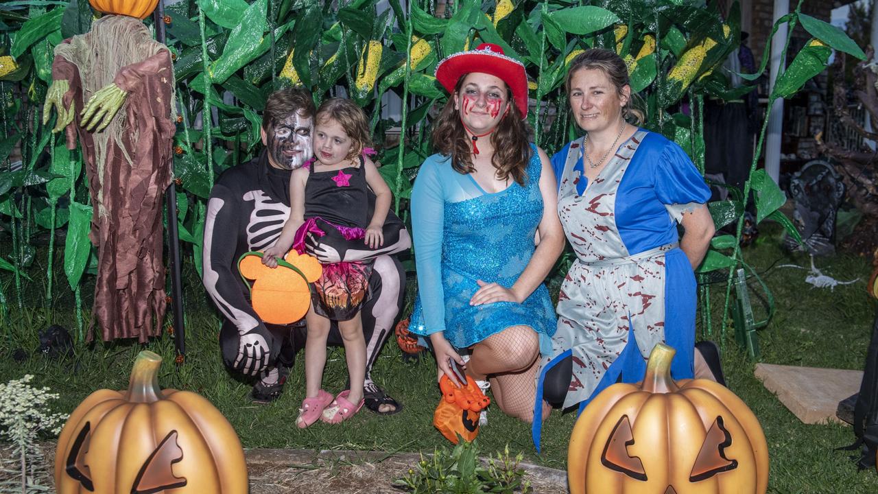 (from left) Dan and Billie Childe with Briella and Sandie Olive visit the Halloween display of Jo Philp. Monday, October 31, 2022. Picture: Nev Madsen.