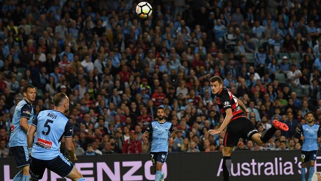 Oriol Riera of the Wanderers headers the ball to score the first goal during the round 3 A-League football match between Sydney FC and Western Sydney Wanderers at the Allianz Stadium in Sydney, Saturday, October 21, 2017. (AAP Image/David Moir) NO ARCHIVING, EDITORIAL USE ONLY