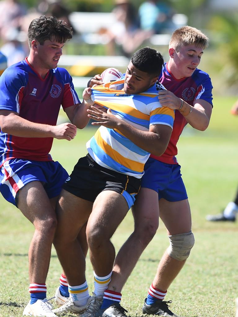 Boys Rugby League State Championship held at Northern Division, Brothers Leagues ground, Townsville. 16-18 years. Peninsula (stripe) v Darling Downs (blue/purple). Jason Hastie of Mareeba SHS