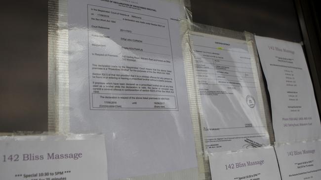 Signs on the window at a massage parlour in Malvern East. Picture: Supplied