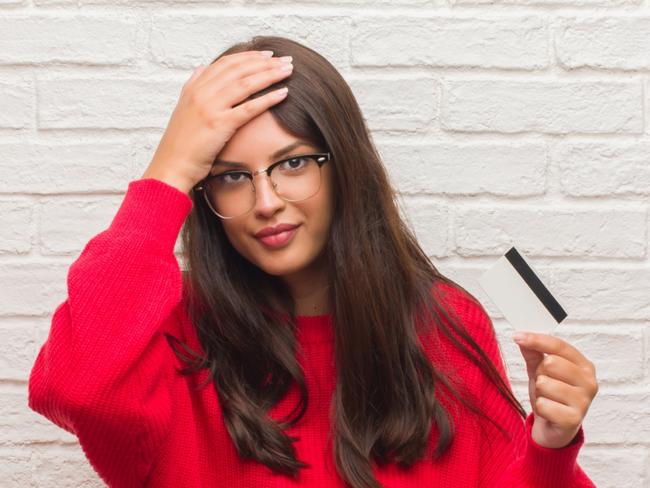 A young woman worried about her credit card debt. Picture: iStock.