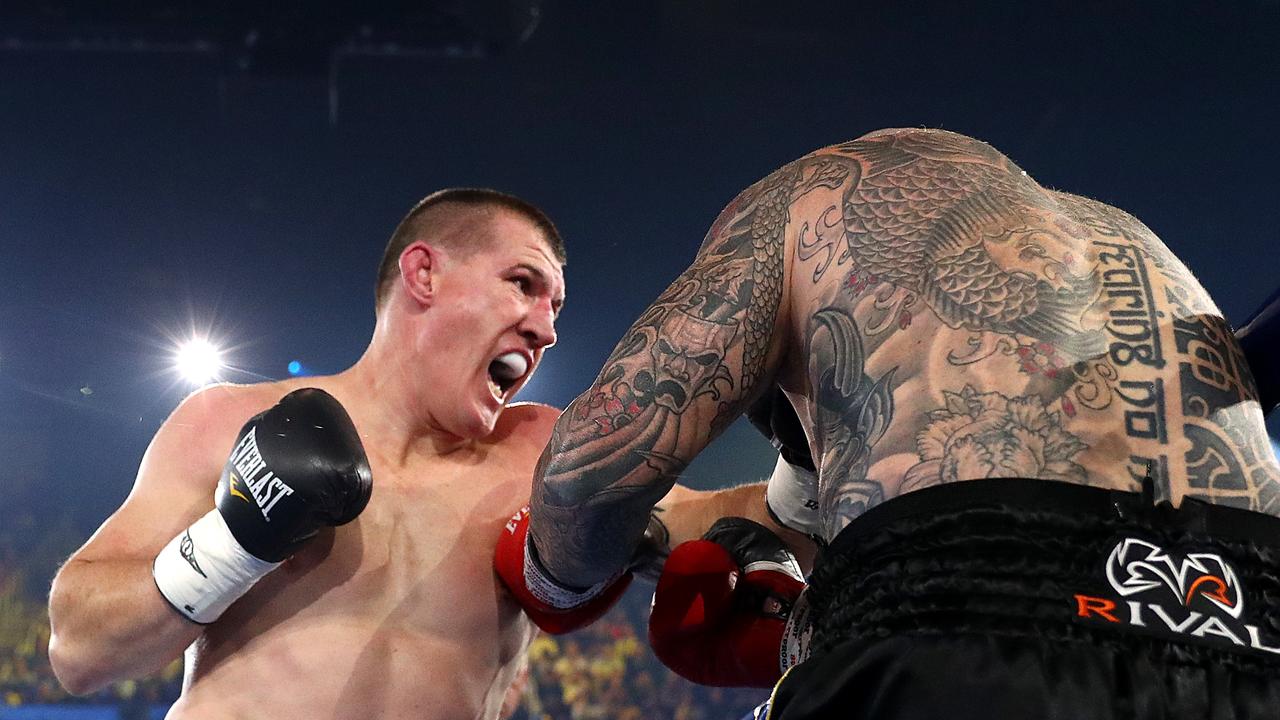 WOLLONGONG, AUSTRALIA - APRIL 21: Paul Gallen punches Lucas Browne during their bout at WIN Entertainment Centre on April 21, 2021 in Wollongong, Australia. (Photo by Mark Metcalfe/Getty Images)