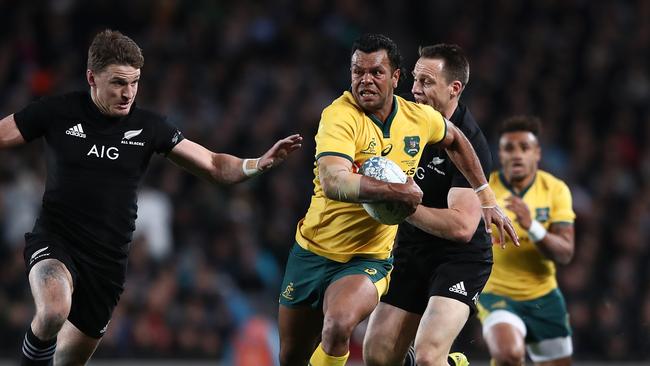 AUCKLAND, NEW ZEALAND — AUGUST 25: Kurtley Beale of the Wallabies makes a break during The Rugby Championship game between the New Zealand All Blacks and the Australia Wallabies at Eden Park on August 25, 2018 in Auckland, New Zealand. (Photo by Hannah Peters/Getty Images)