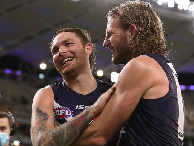 The Dockers celebrate a big win at Optus Stadium.