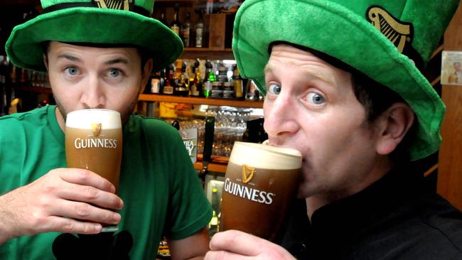 Irish MP212060  Gerry Murphy (L) and Tim Hartnett gear up for St Patricks Day at Harrigan's Irish Pub in Calypso Bay.