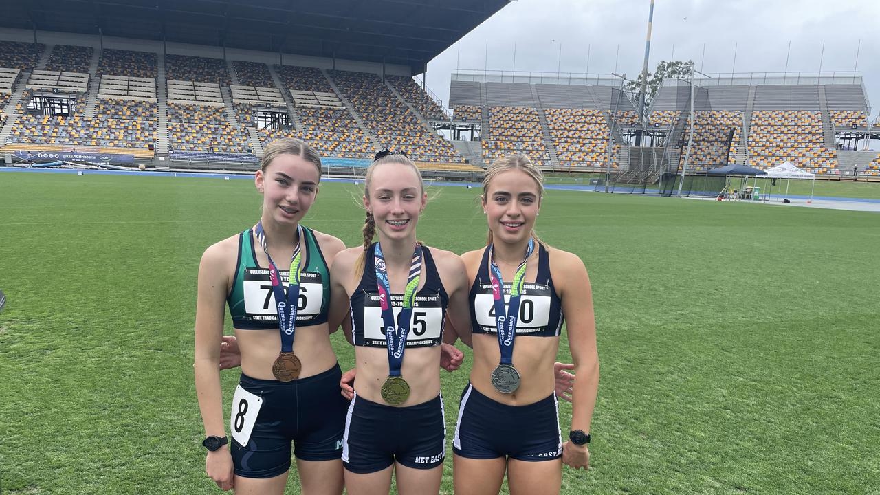 The 800m champion Emma Fryga, middle, alongside Charlize Heathcote, left, and Abbie Heggarty.