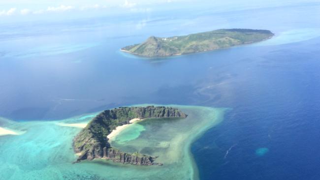 Waua Islet in the eastern Torres Strait with Murray Island in the background.