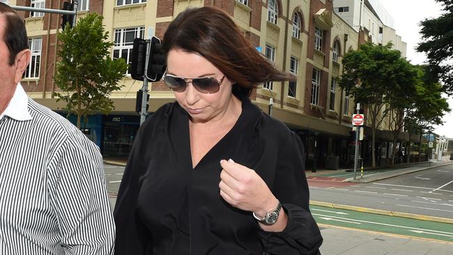 Nicole Bricknell, the ex-wife of former Billabong boss Matthew Perrin, arrives at the District Court. Picture: Dan Peled