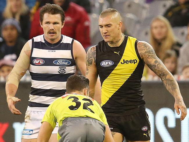 AFL Round 13. 17/06/2018.  Geelong v Richmond at the MCG .   Richmond's Dustin Martin talks with field umpire Jacob Mollison after Mollison awarded Geelong's Patrick Dangerfield a free kick for in the back   . Pic: Michael Klein