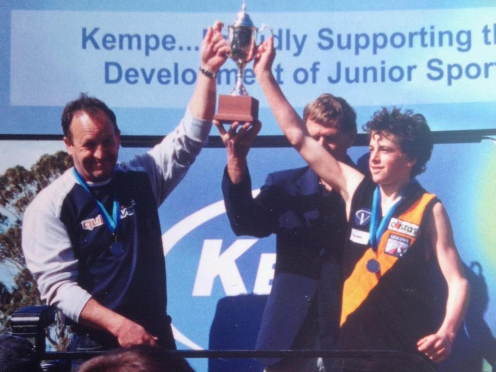 Port Adelaide great Travis Boak after winning an under-14 flag for Torquay, alongside his dad and coach Roger. Picture: Supplied