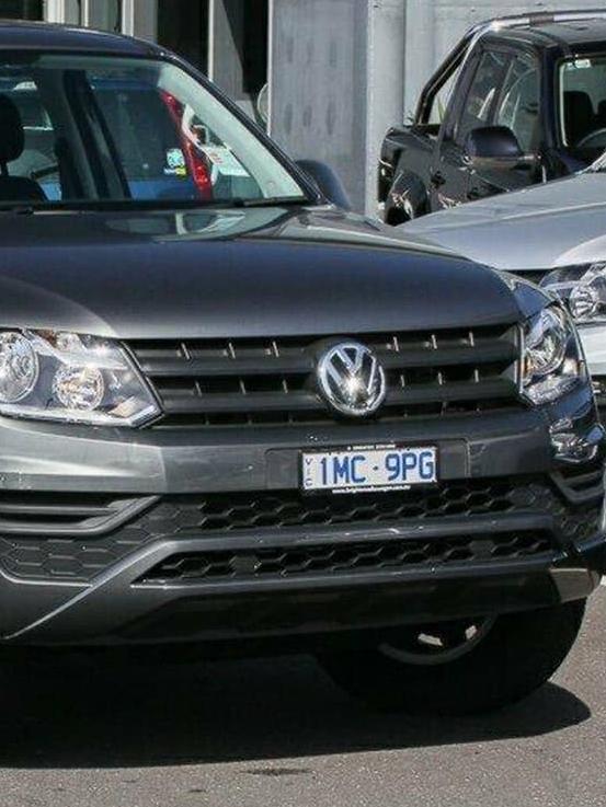 A Volkswagon Amarok in a Brighton car yard with the registration 1MC 9PG