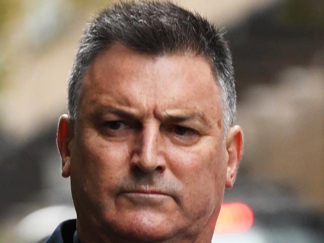 Victoria Police Assistant Commissioner Robert Hill enters the Victorian Royal Commission into Lawyer X, Melbourne, Wednesday, May 15, 2019. Victoria Police Assistant Commissioner Robert Hill is due to front the royal commission into the force's use of a criminal lawyer as an informant during Melbourne's gangland war. (AAP Image/James Ross) NO ARCHIVING