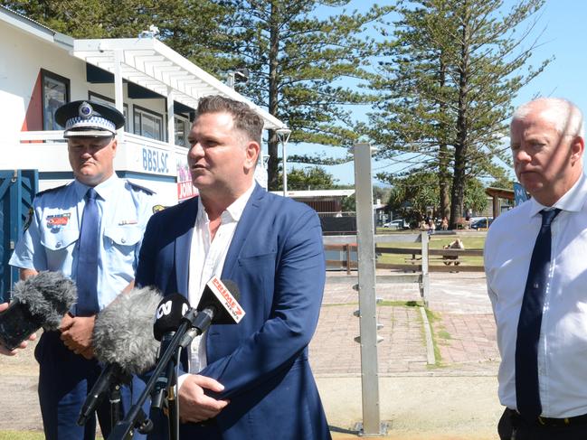 Byron mayor Simon Richardson (centre) and other local authorities have asked Year 12 graduates planning to visit Byron Bay for Schoolies to consider delaying their trip if they can.