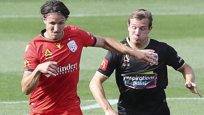 Adelaide United defender Michael Marrone is hopeful the A-League season will resume following its suspension due to the coronavirus. Picture: Sarah Reed