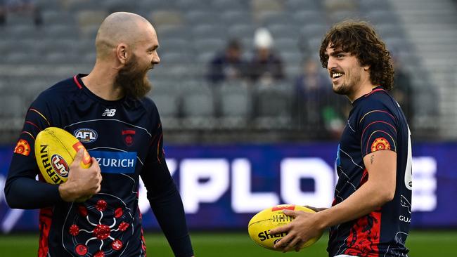 PERTH, AUSTRALIA - JULY 29: Max Gawn cheats with Luke Jackson of the Demons during the 2022 AFL Round 20 match between the Fremantle Dockers and the Melbourne Demons at Optus Stadium on July 29, 2022 in Perth, Australia. (Photo by Daniel Carson/AFL Photos via Getty Images)