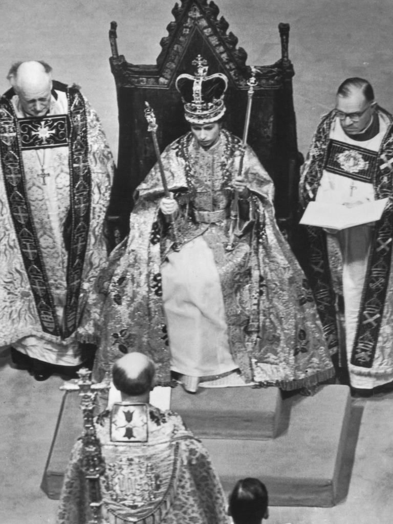 1953 – Queen Elizabeth II in Westminster Abbey during her coronation, 2nd June 1953. (Photo by Hulton Archive/Getty Images)