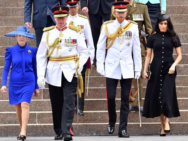 Prince Harry with his wife Meghan, Duchess of Sussex are accompanied by New South Wales Governor David Hurley and his wife Linda. Picture: AFP