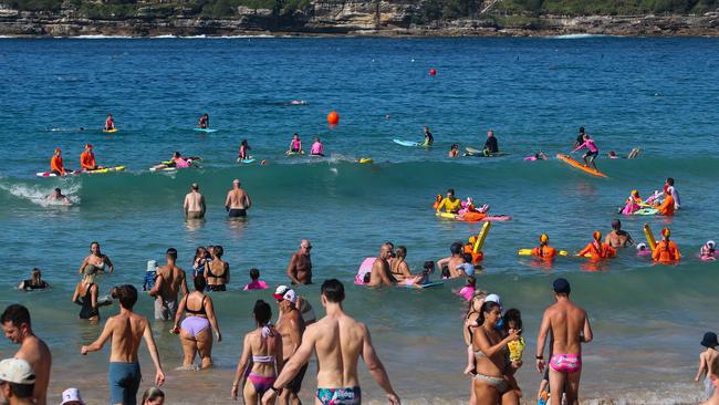 Two of the four swimmers pulled from the beach were later hospitalised in a stable condition. Picture: NCA NewsWire/ Gaye Gerard