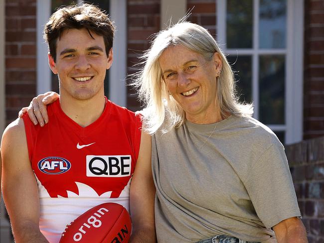 The pair are now diehard Swans supporters and wouldn’t have it any other way. Picture: Phil Hillyard