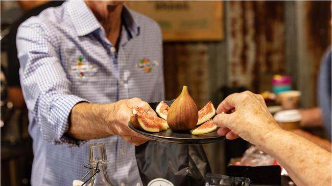 Tasting figs at Alloway Farm Market, Bundaberg