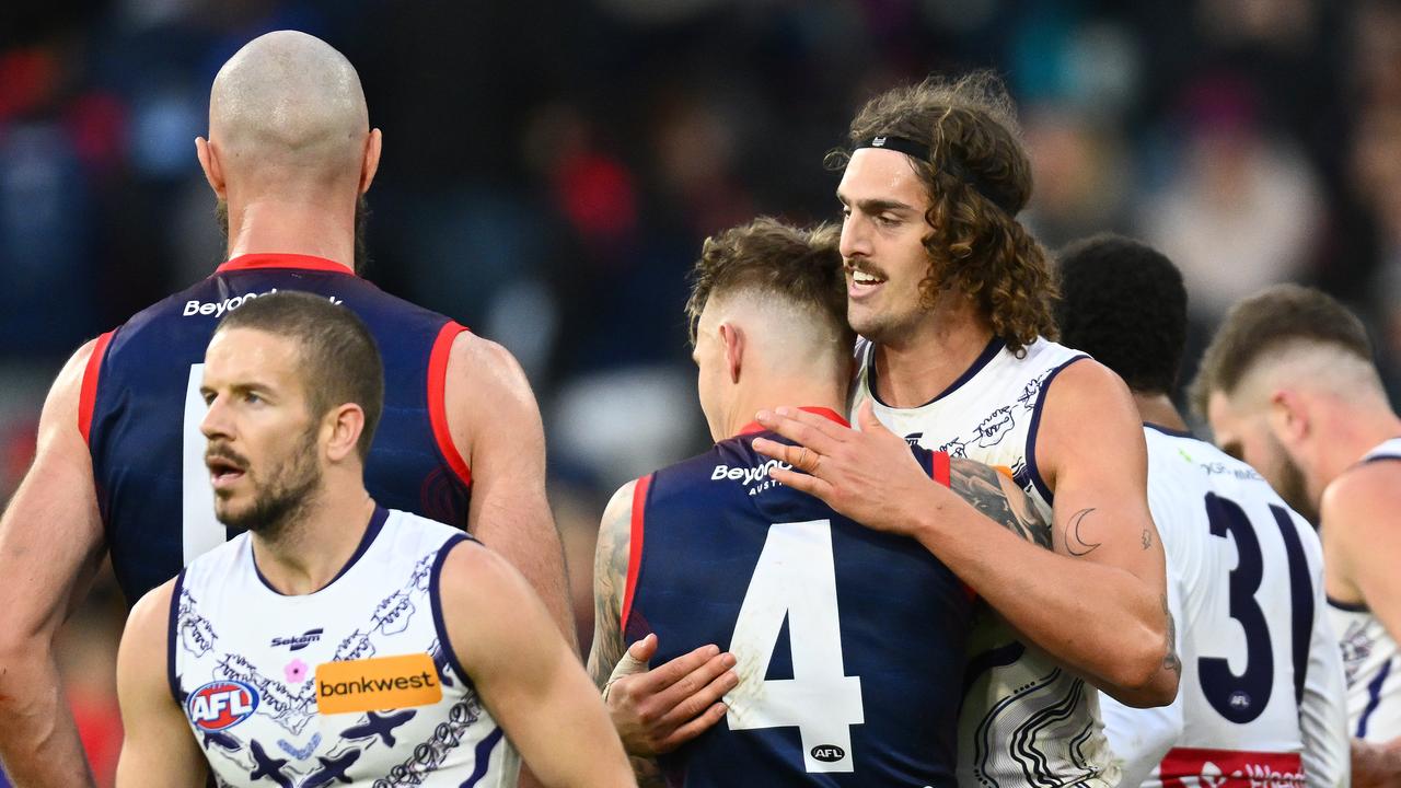 MELBOURNE, AUSTRALIA - MAY 27: Luke Jackson of the Dockers hugs James Harmes of the Demons after winning the round 11 AFL match between Narrm Football Club / Melbourne Demons and Walyalup / Fremantle Dockers at Melbourne Cricket Ground, on May 27, 2023, in Melbourne, Australia. (Photo by Quinn Rooney/Getty Images)