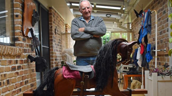 Neil Stuart makes rocking horses and wooden cars at his home in Evans Head