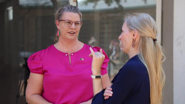 CLP business and tourism spokeswoman Marie-Clare Boothby speaking with Treeti Business Consulting's Megan Holzfeind outside an empty shopfront in the Smith Street Mall. Picture: Supplied