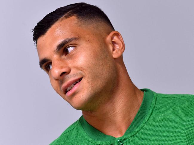 Australia's forward Andrew Nabbout waits outside a press conference room in Kazan on June 13, 2018, on the eve of the start of the Russia 2018 World Cup football tournament.   / AFP PHOTO / SAEED KHAN