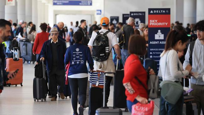 A significant flight delay, per the policy, constitutes three hours for a domestic flight and six hours for international. Picture: David Swanson / AFP